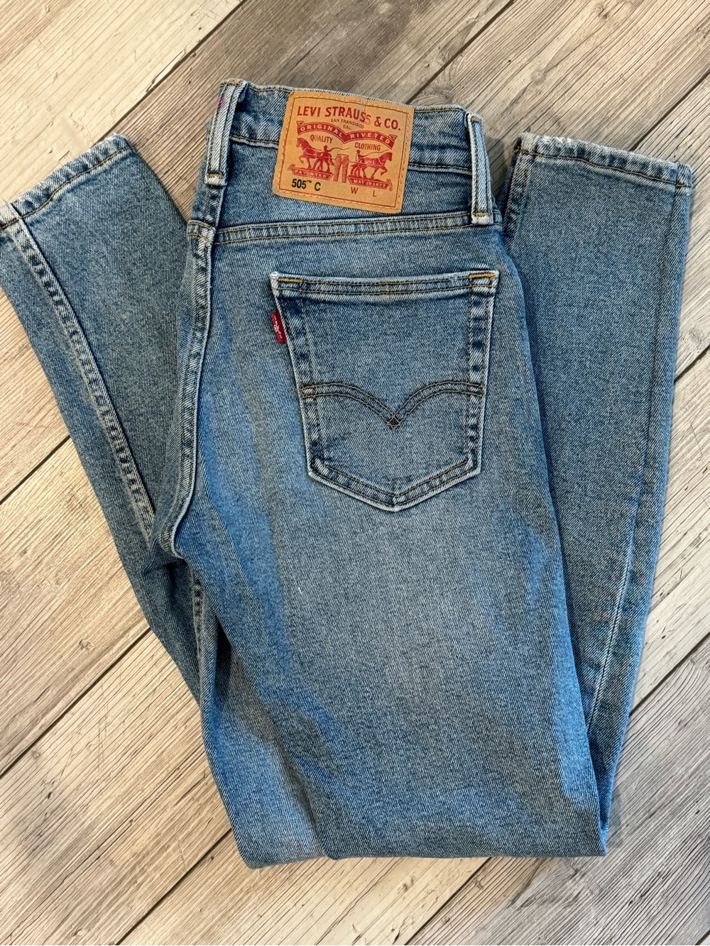 Levi's light blue denim jeans with cream interior label